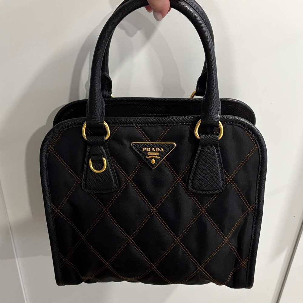 Prada Black Quilted Satchel with Gold Accents